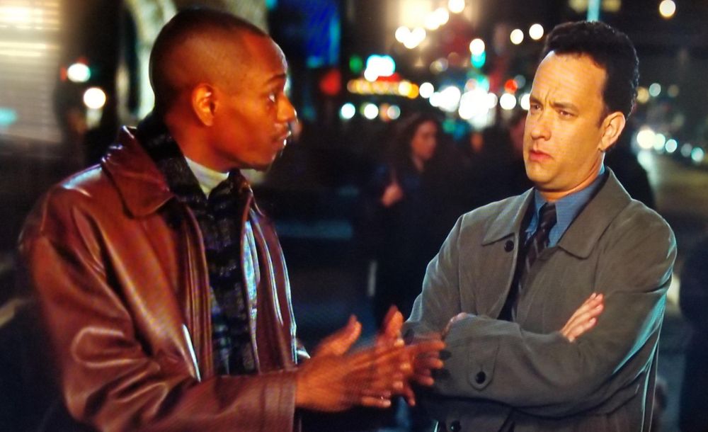 Dave Chappelle and Tom Hanks in a scene from the movie "sleepless in Seattle"