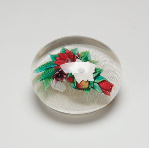 latticino background; red poinsettia and white poinsettia surrounded by green leaves and red rosebud and purple flower and fruit