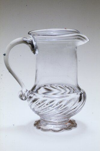 Possibly 'Midwestern' unusual because of scalloped foot; reattributed by Arlene Palmer Schwind as Norwegian Jan. 9, 1990.