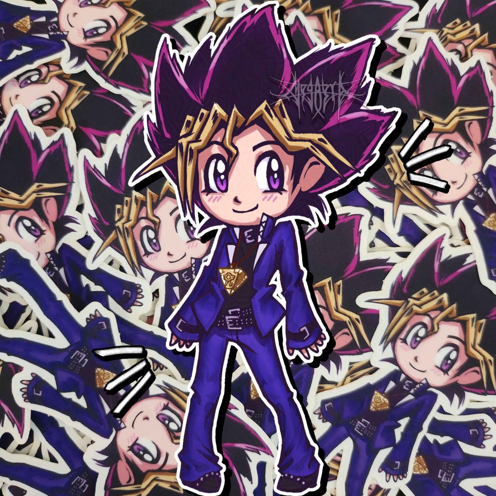 Yugi mutou from Yu-Gi-Oh duel monsters is in chibi form posing like hatsune miku on a sticker