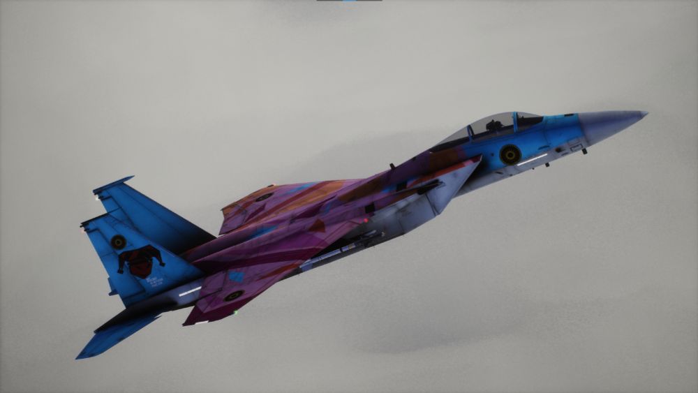 Comic's F-15 painted with trans and lesbian pride colors.