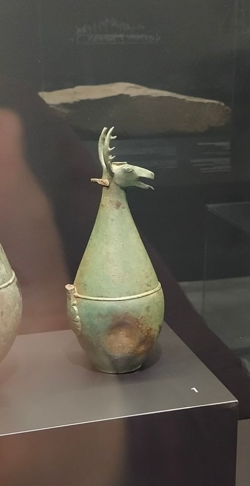 Liquid recipient, possible for wine or any other important liquid. The fine made piece has, as the top, the head of a deer, and the liquid pours from its mouth. Found in Cancho Roano Archaeological Site.