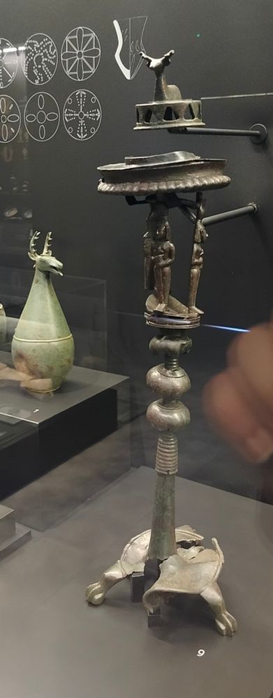 Essence burner found isolated. The top belongs to another essence burner but they have beer paired to illustrate how they worked. The top represents a deer with small holes to let the essence. The middle has three Astarte representations holding the burner. At the bottom, the burner is being held by three feline paws.