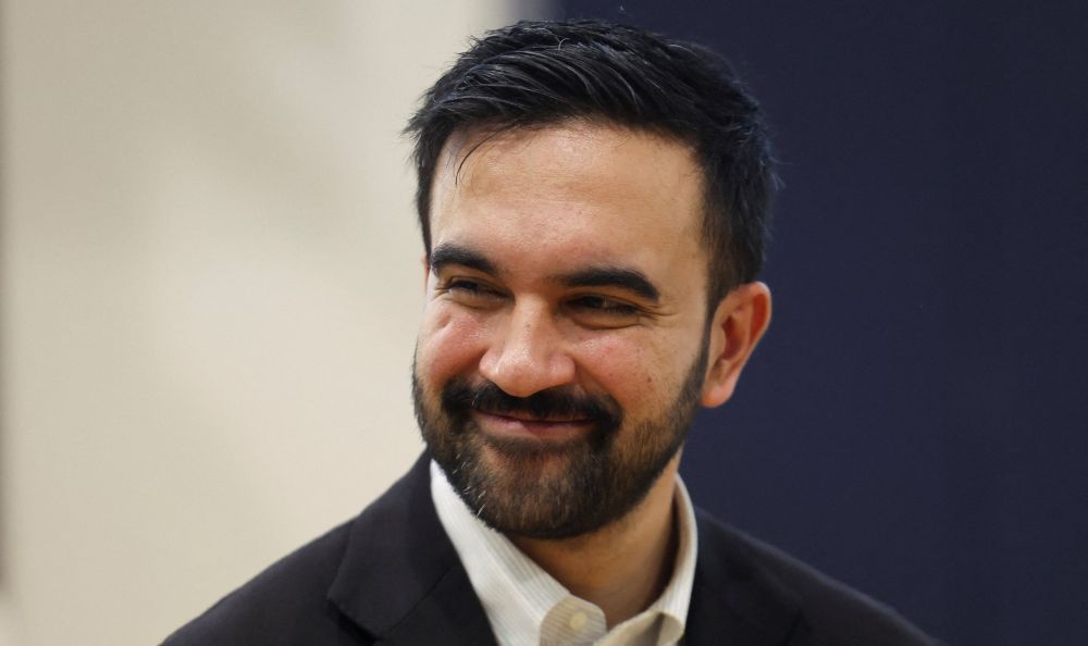 Zohran Mamdani smiling 