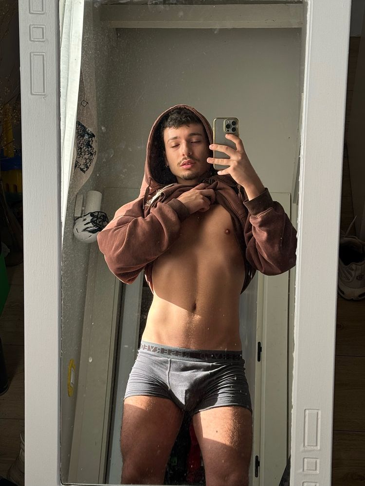 brown sweater, not that you can see much of it 