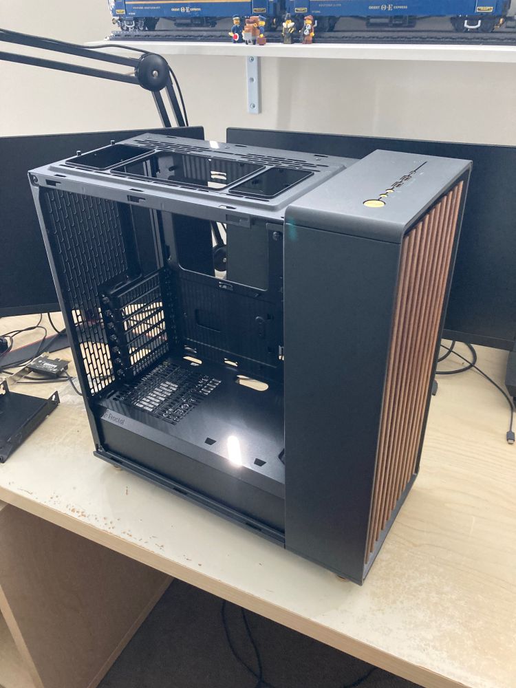 New PC case, panels removed, on my desk. Nothing is in it for the moment