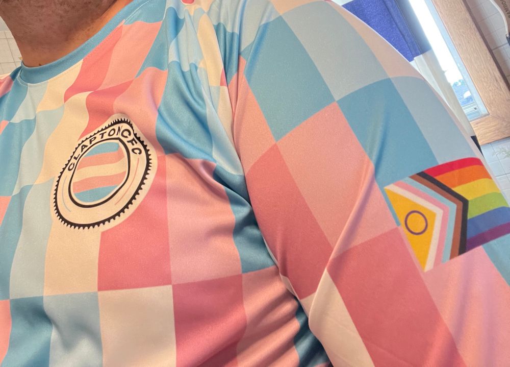 Clapton CFC keeper shirt in a checkered pattern using trans colours with the intersex inclusive pride flag 