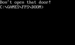 Screenshot of an MS-DOS prompt. The game of Doom has crashed with the message, "Don't open that door!"