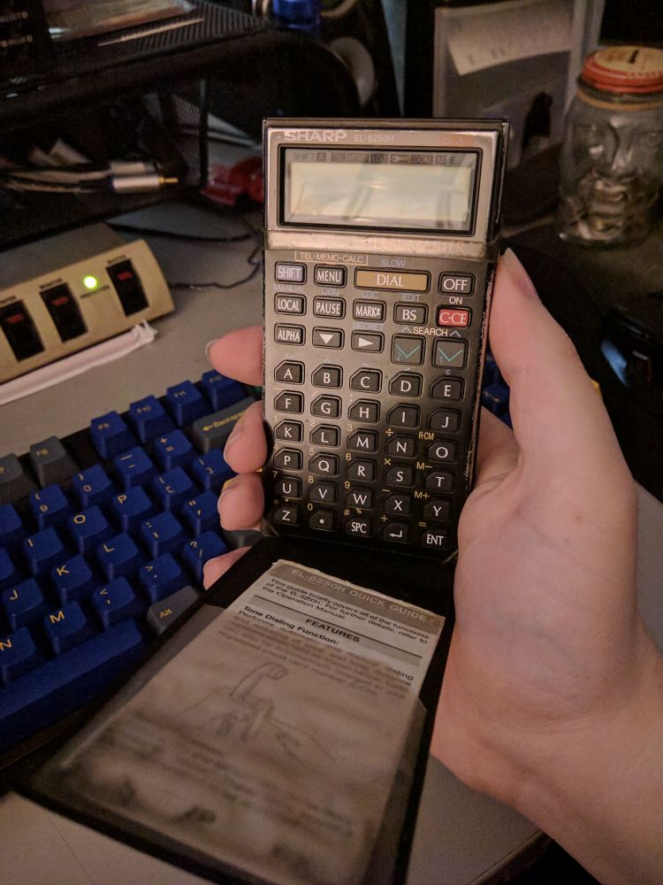 The Sharp pocket phone book and dialer. It resembles a scientific calculator, but the keypad is alphabetical, with the numbers requiring a shift key.