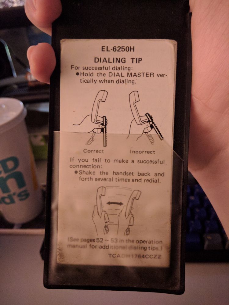 Inside the cover flap is a set of instructions. 

EL-6250H
Dialing Tip 
For successful dialing: 
Hold the DIAL MASTER vertically when dialing.

If you fail to make a successful connection: 
Shake the handset back and forth several times and redial.