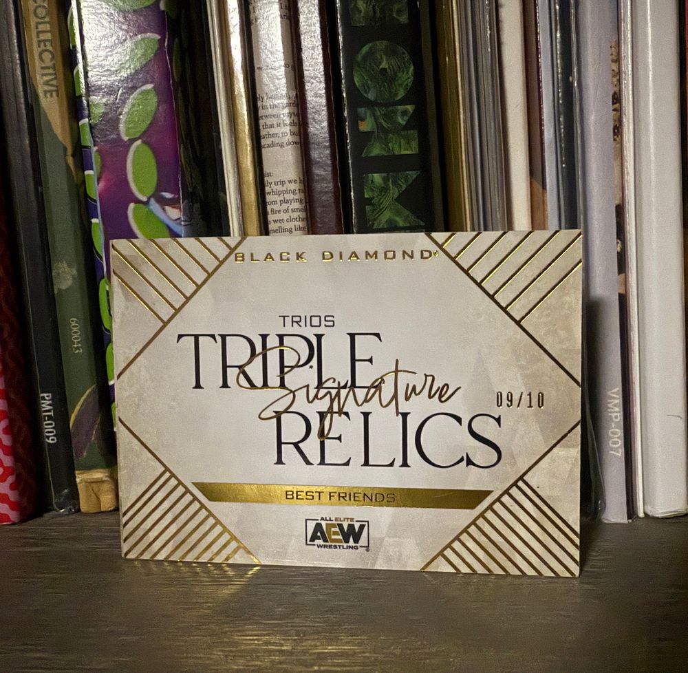 Front of a Topps Triple Relic of Best Friends