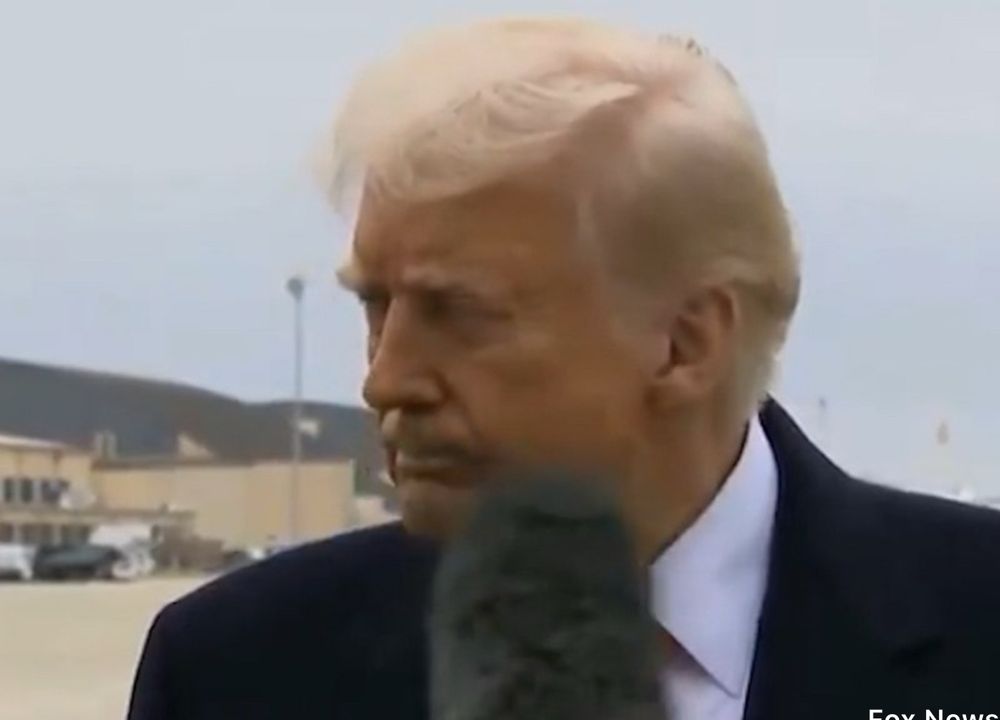 President Trump bonked In Face by Microphone 