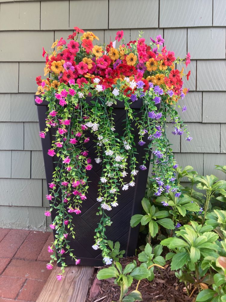 a planter full of flowers