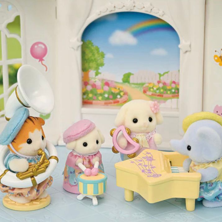 Sylvanian families set released last year, ほいくえん発表会セット -ドレミファ音楽隊- (Nursery School Presentation Set: Do-Re-Mi-Fa Brass Band). A maple cat baby plays a sousaphone, a lop baby plays a drum, a slightly bigger lop rabbit baby plays a moon shaped tambourine, and a baby elephant plays piano.