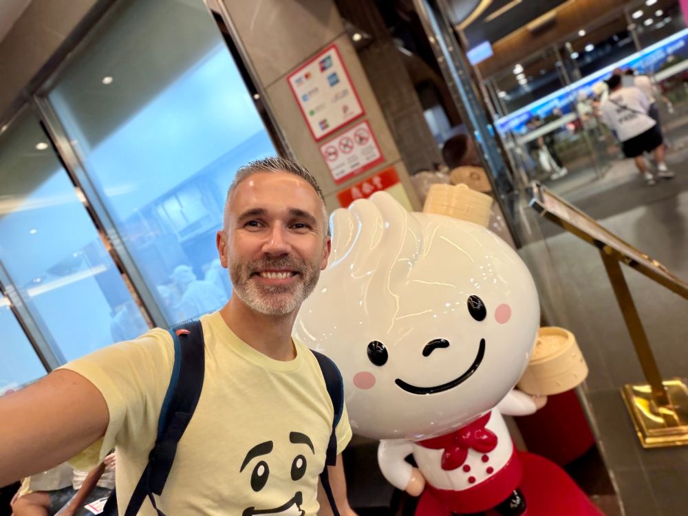 A selfie. Keith (L) with Bao Bao, the Din Tai Fung mascot(R)