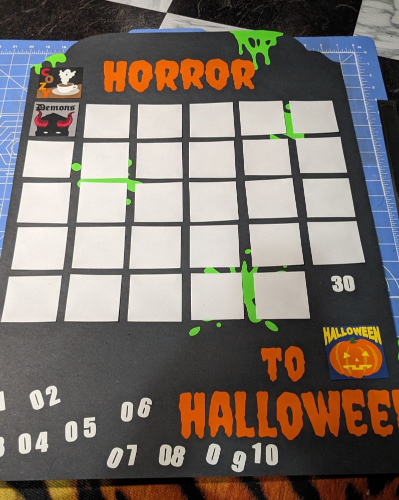 Work in progress. Poster board sized countdown to Halloween calendar with each square representing a different horror subgenre 