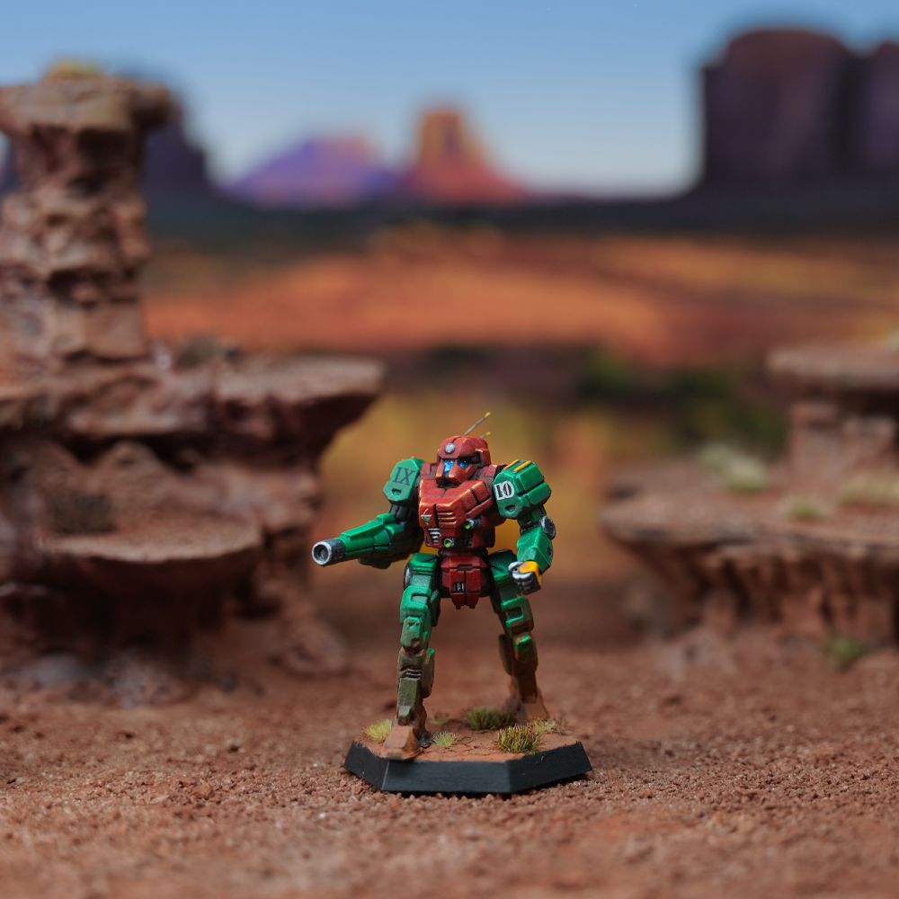 Clint battlemech painted in 9th Sian Dragoons scheme. Red torso with green limbs and orange highlights. 