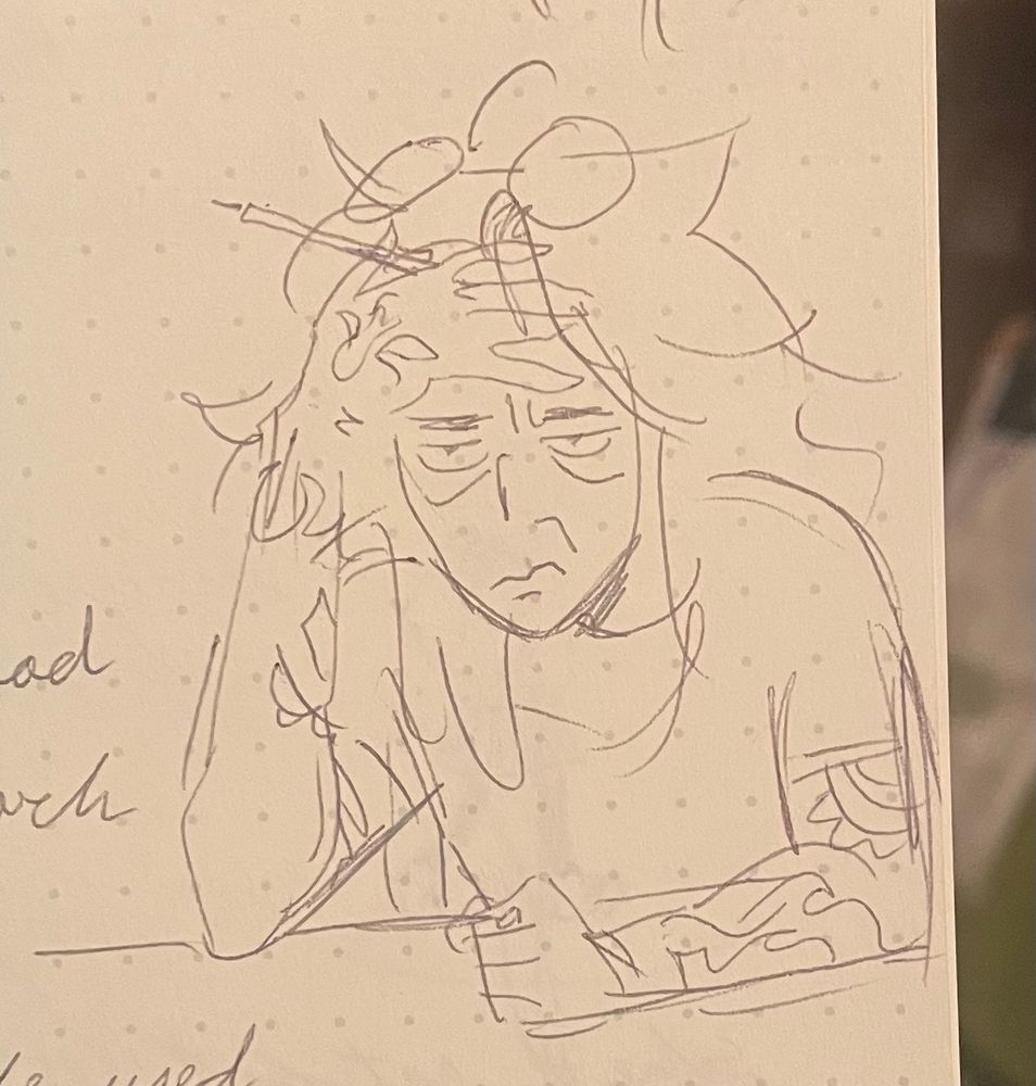 Tired looking self portrait in pen