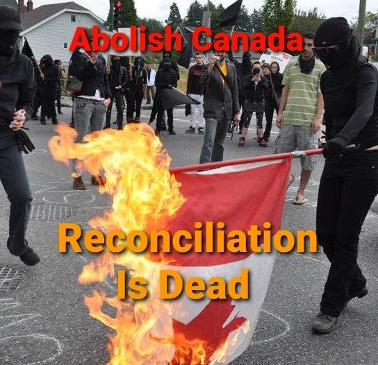 A photo of multiple people in bloc burning a canadian flag with the text 
