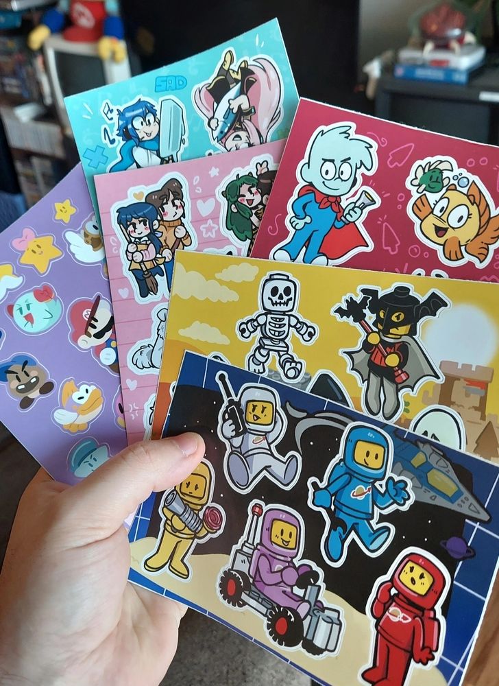 Sticker Sheets of Paper Mario, Vocaloid, Rumiko Takahashi series, Humongous Entertainment characters, and Lego Space/Castle