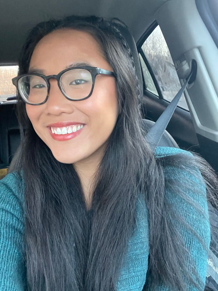 selfie of me
asian woman with black hair
blue green sweater 