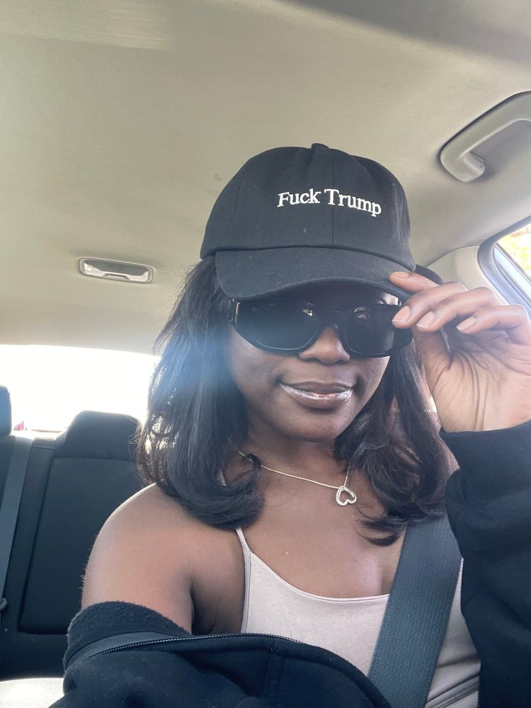 Pissed off (but extremely pretty) black American woman who hates Nazis 