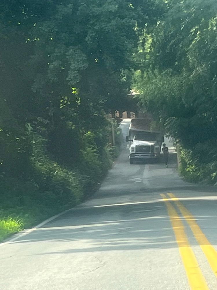 A box truck stuck under the old ivy underpass around 9am Monday 