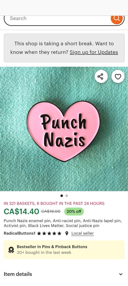 Pic is a Screenshot of an Etsy listen for a lapel pin shaped like a heart that says "punch not-seas" from RadicalButtons1 on etsy