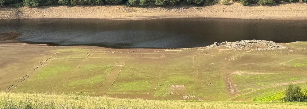 Water level in Ladybower reservoir sufficiently low that one can see the outline of Tin Town. This was an encampment built to house the navvies who built the reservoirs