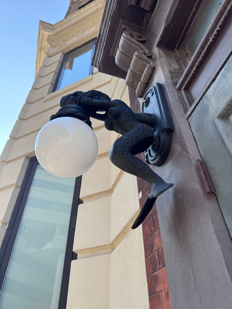 Light fixture in the shape of a mermain, on I Street NW in downtown Washington, DC