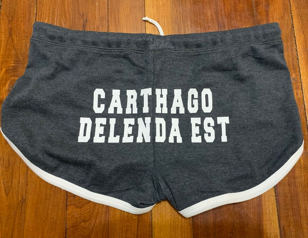 booty shorts that say CARTHAGO DELENDA EST