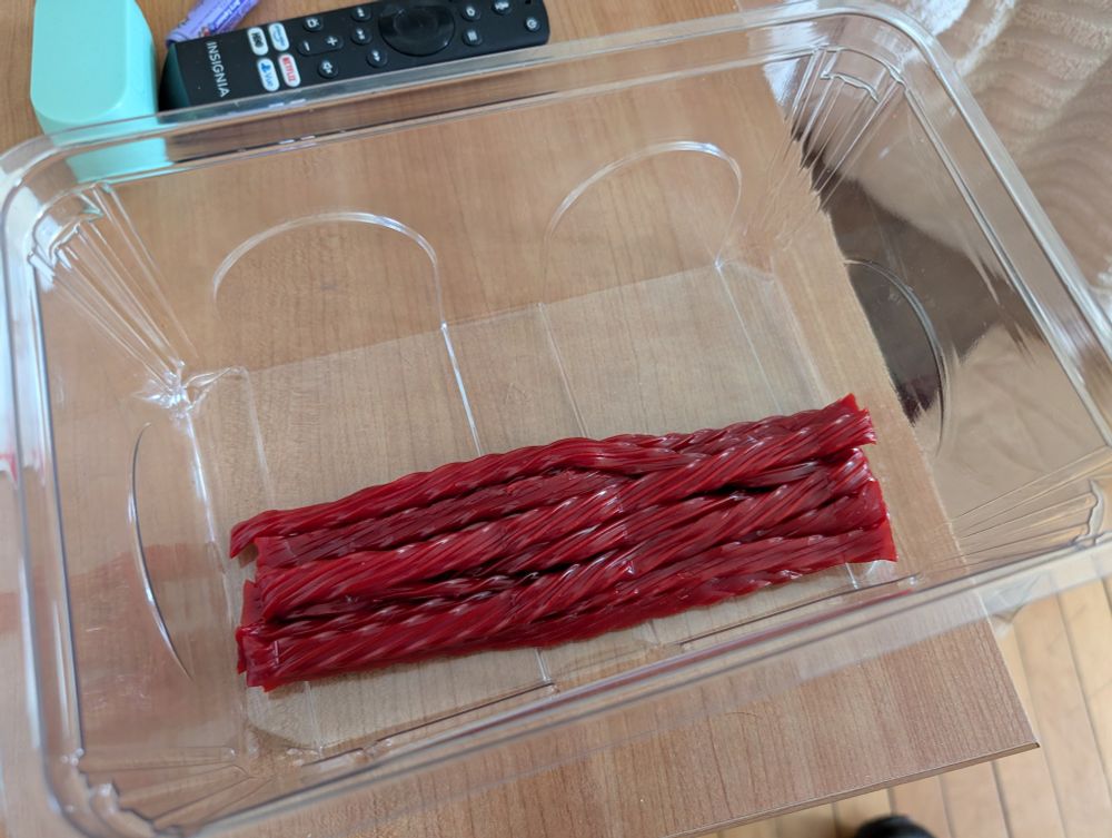 Nearly empty giant box of Twizzlers 