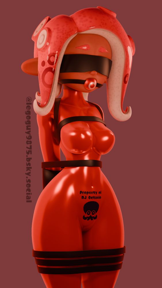 Agent 8 bound in a tight red leather jumpsuit and various black belts. She is also blinded and gagged. On the crotch of the jumpsuit is the Octarian emblem, and a message reading "Property of DJ Octavio"