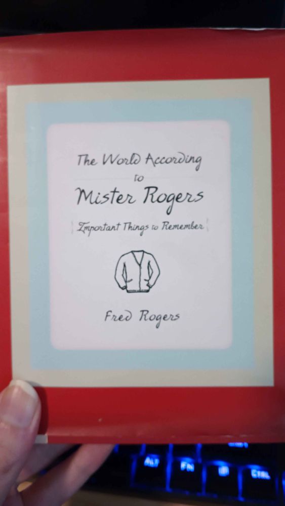 A copy of The World According to Mister Rogers.