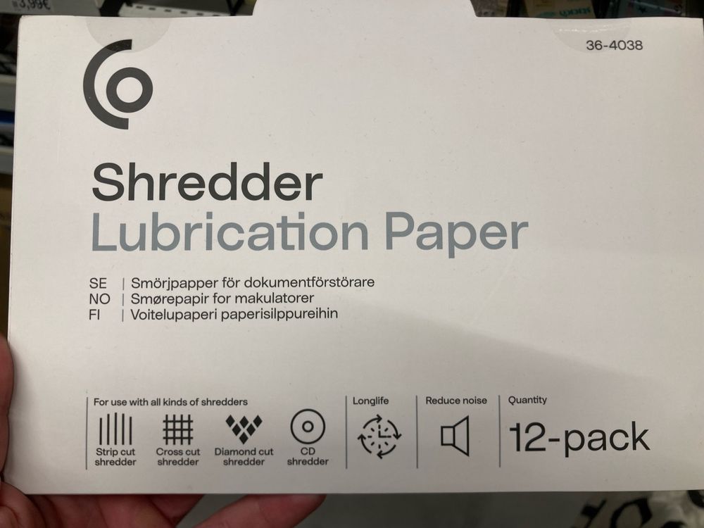 A packet of paper with the words “Shredder Lubrication Paper” on the label