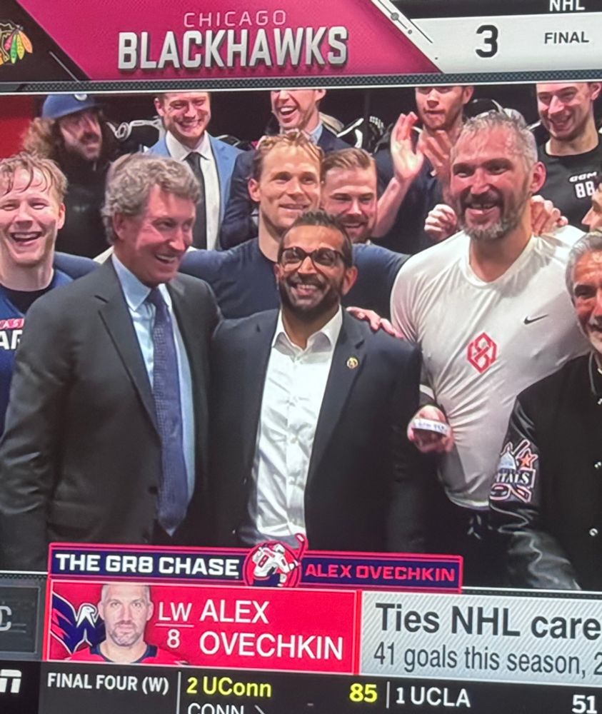 Kash Patel posing with Ovi and Gretzky after the game 