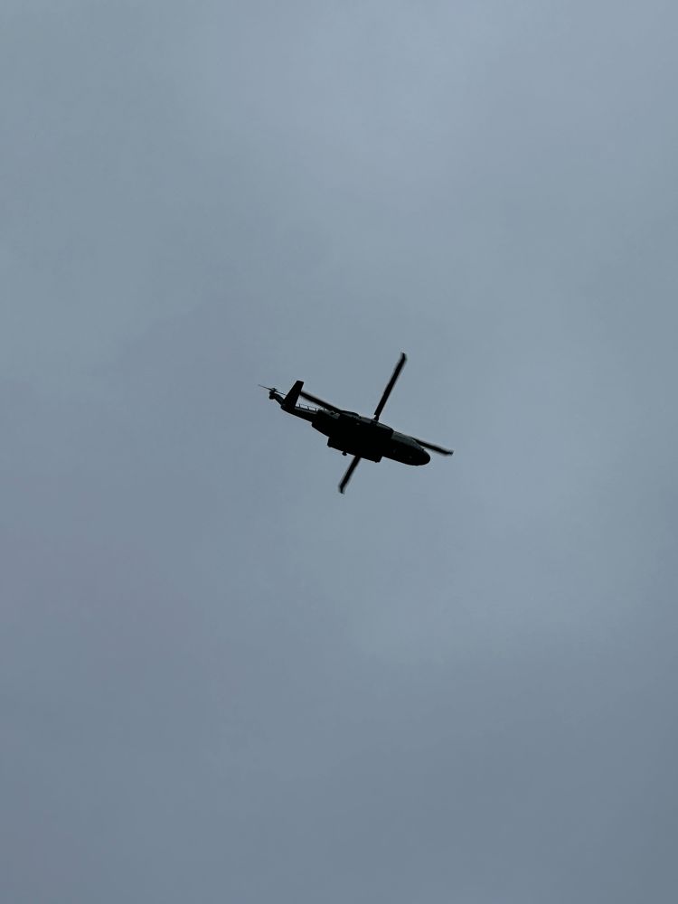 A helicopter flying over townhouses in D.C.
