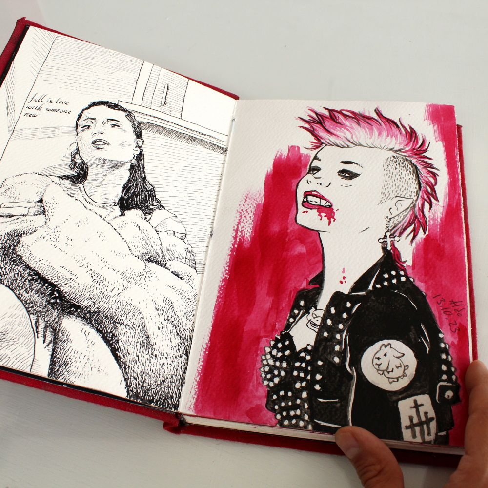 Drawing from a sketchbook, showing a goth-punk vampire in ink.