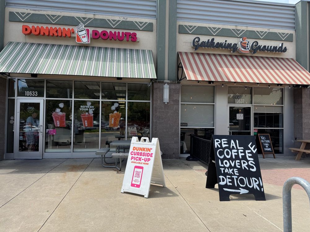 Sign next to Dunkin Donuts: Real coffee lovers take detour! photo by Zach Schrag