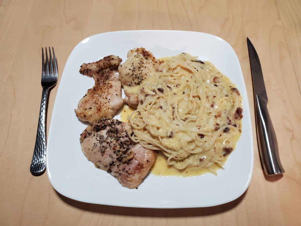 Spaghetti Carbonara made with 2 eggs, a 1/4th cup of mozz cheese, a pinch of bacon bits and 2oz of Carbe Diem Spaghetti (16g net grams of carbs and 110 calories) with 3 chicken thighs, boneless, each seasoned with a different type of bread dip seasoning mix to add extra variety!