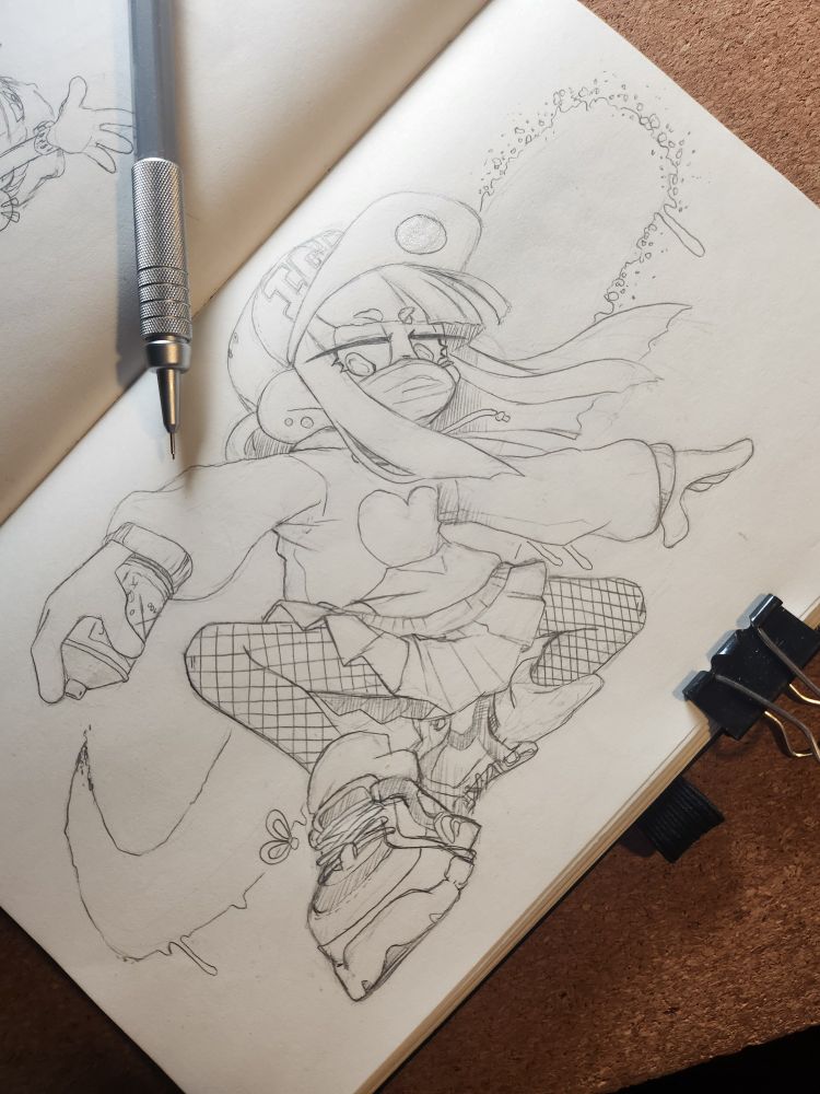 An open sketchbook with a page filled with m original character CMYK-chan. She is posing dynamically on one knee while using a spray can.