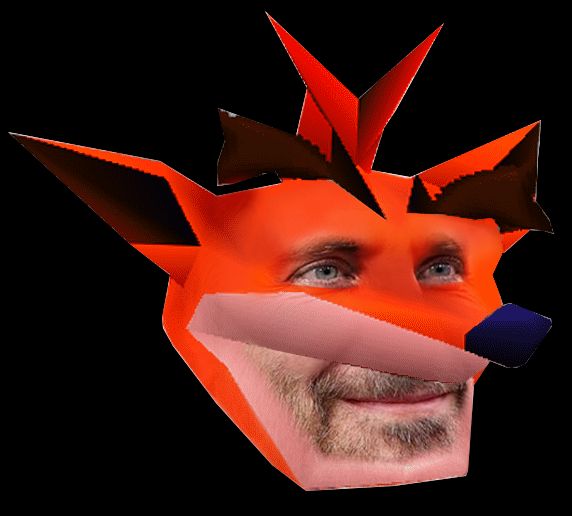 Image of low polygon PS1 Crash Bandicoot's face merged with actor Bradley Cooper's face. It's mostly his eyes and closed mouth smile that shine through the visage of orange bandicoot skin.
