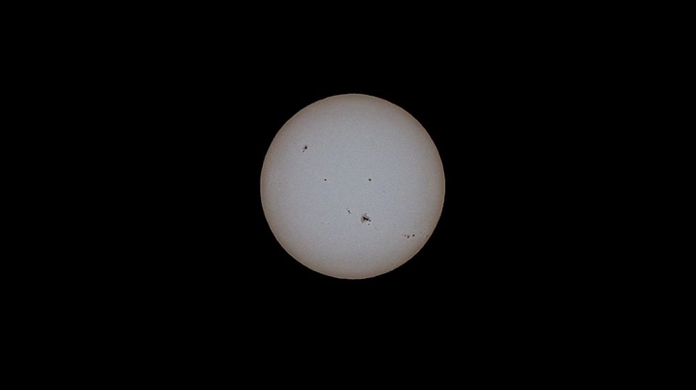 sun with visible sunspots