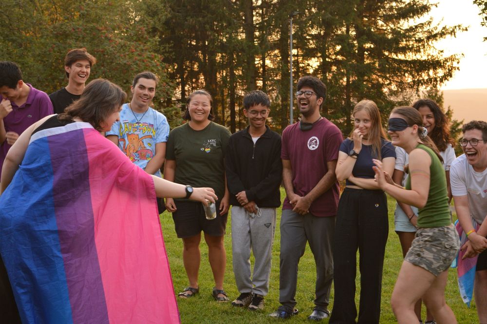Participants laughing in circle during NAP time