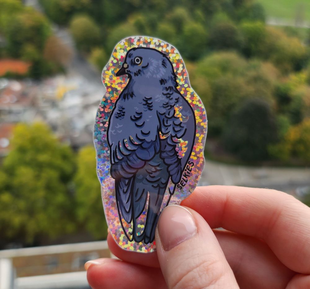 A glittery sticker of a pigeon 