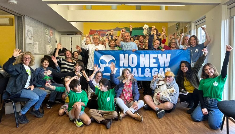 Crowd with No new coal and gas banner inside Reynard st neighbourhood house