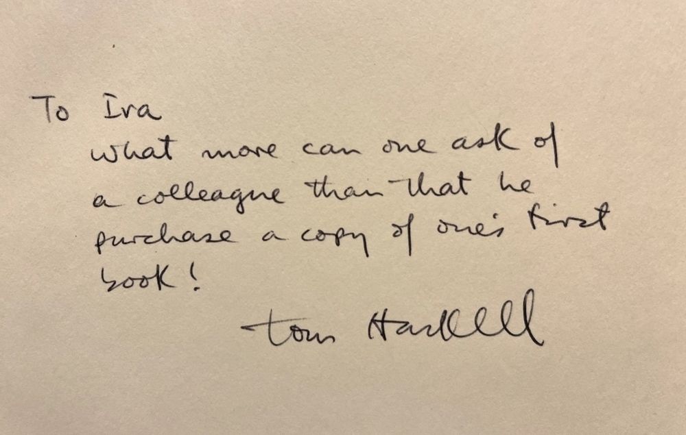 A handwritten inscription in a book reads, To Ira, What more can one ask of a colleague than that he purchase a copy of one's first book!