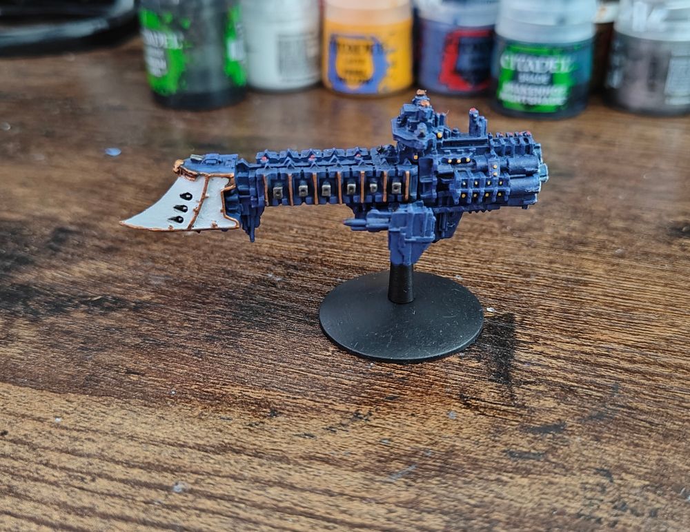 A Dauntless Class Light Cruiser in a blue and white colour scheme 