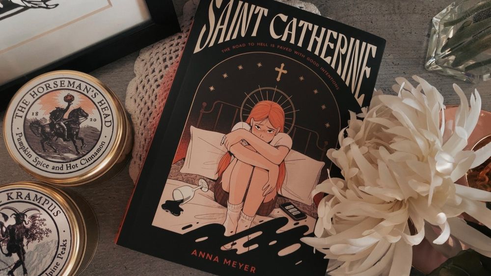 Photo of a comic book cover surrounded by props and flowers