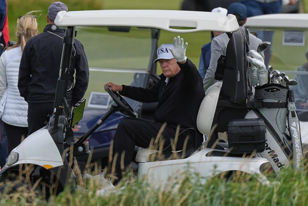 Trump plays golf in Scotland while hundreds of protesters gather at U.S. Consulate